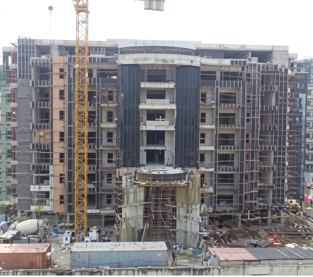 Multi-storey residential building under construction with a tower crane at Ahmodu Tijani, Victoria Island