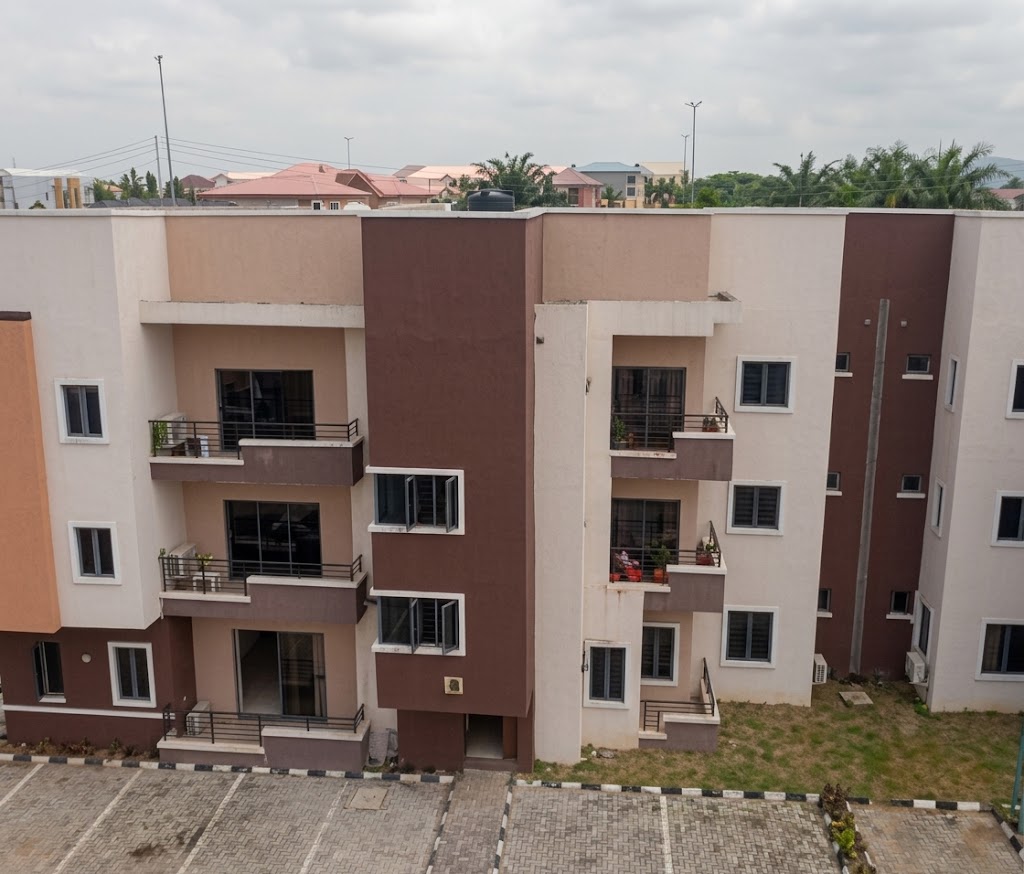 Three-storey apartment block with balconies in Ikeja GRA, Lagos